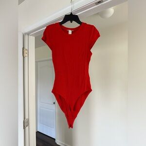 H&M Red-Orange Ribbed Bodysuit - Size Small